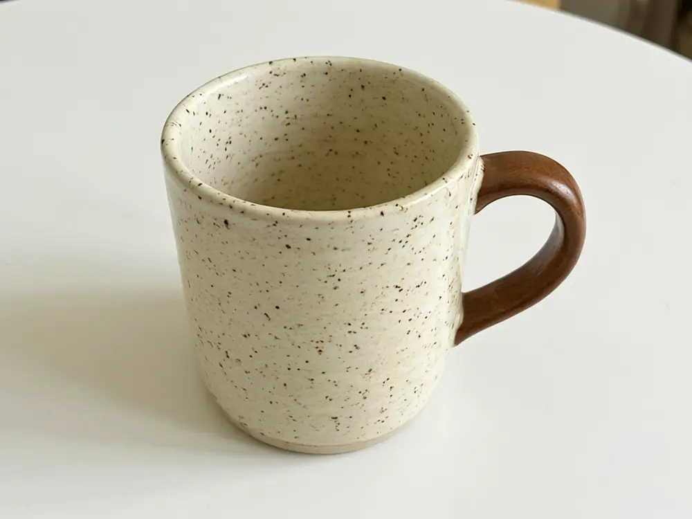 Etsy listing photo result: mug in a kraft gift box before AI redesign