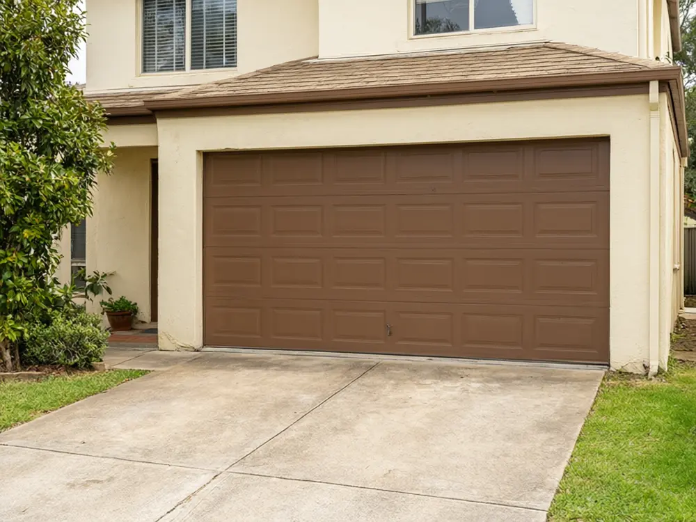Garage door visualizer result: a brown garage door with a row of windows before AI redesign