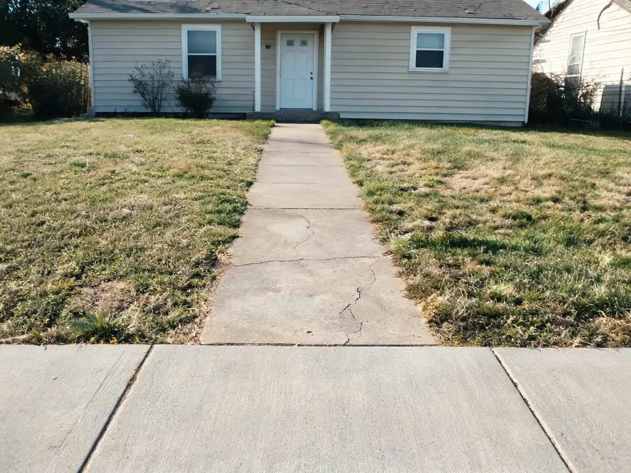AI front yard design: thin lawn transformed into layered curb-appeal planting before AI redesign