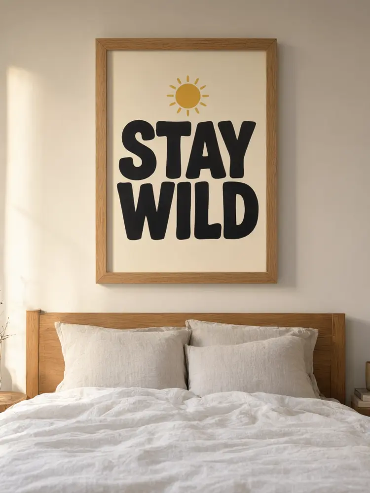Poster mockup result: lettering print in an oak frame above a bed in a bedroom after AI redesign