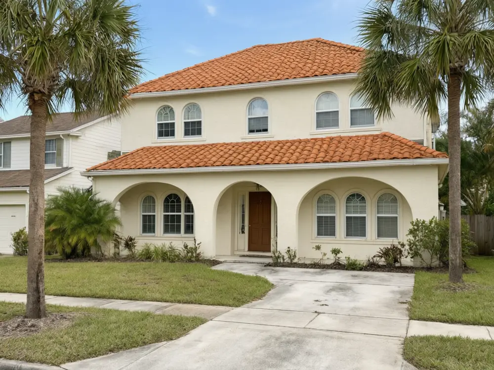 Roof color visualizer result: a house with a new terracotta clay tile roof after AI redesign