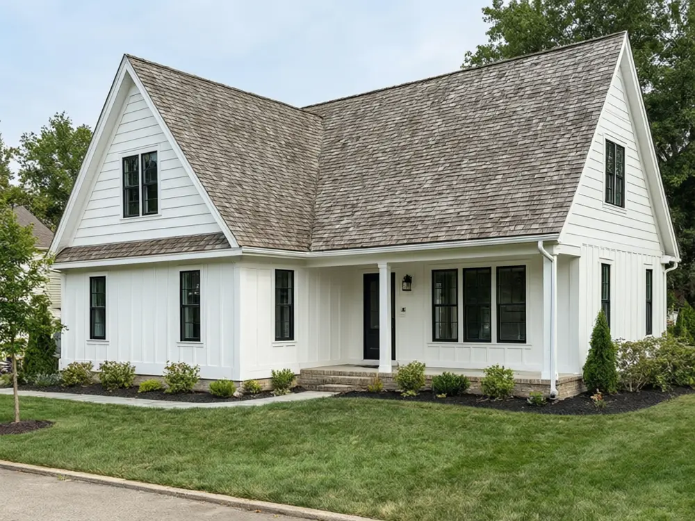 Roof color visualizer result: a house with a new matte black standing-seam metal roof before AI redesign