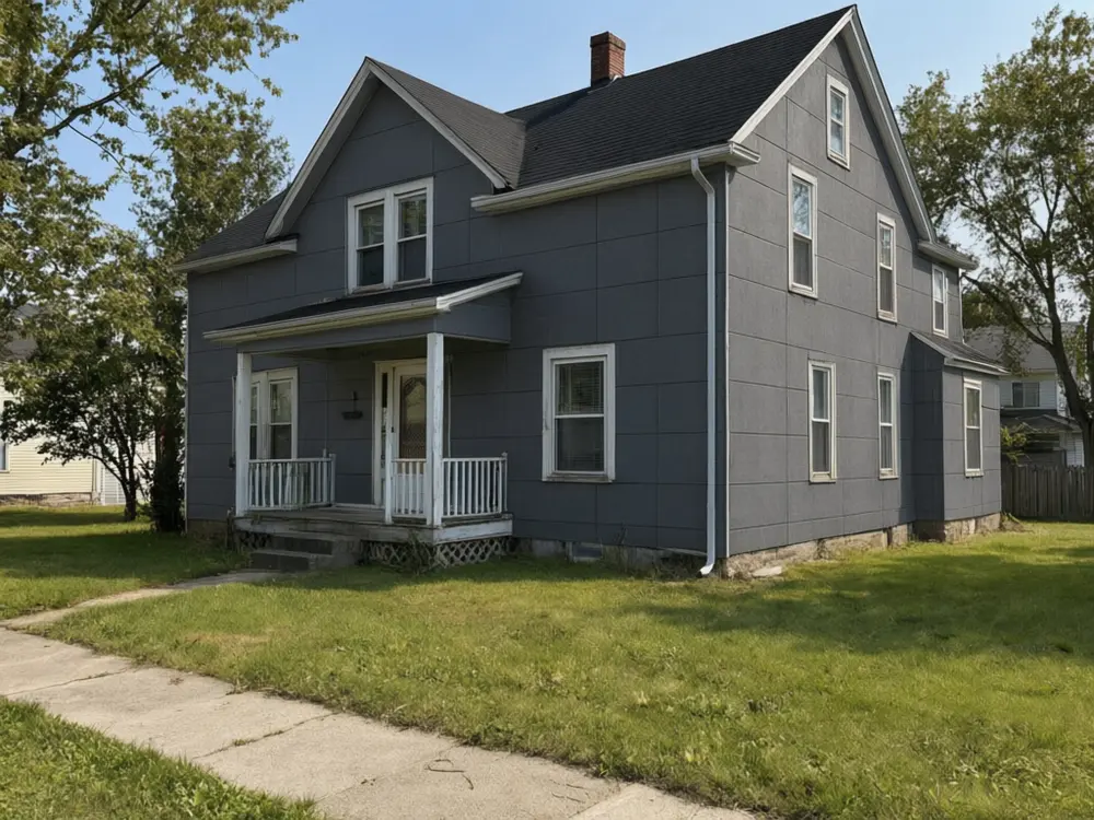 Siding visualizer result: a house with new charcoal smooth panel siding after AI redesign